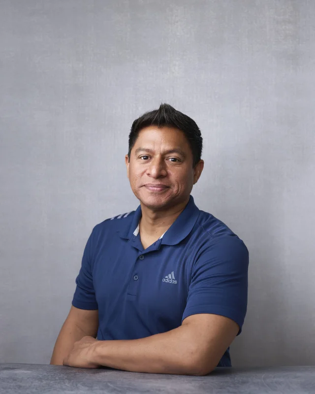 Professional man Peter in business casual with friendly expression